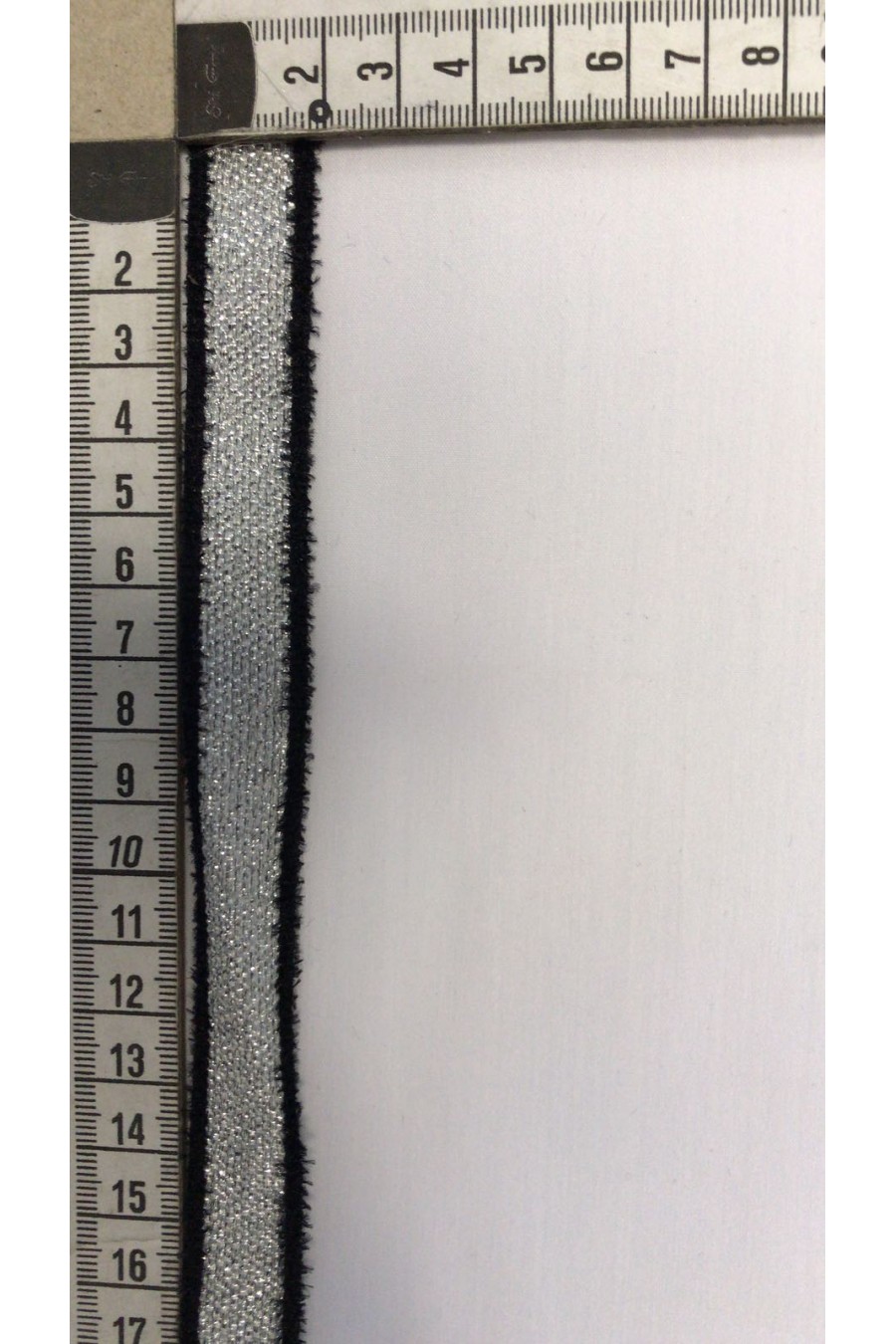 Siyah Kenarlı Simli Şerit, İthal